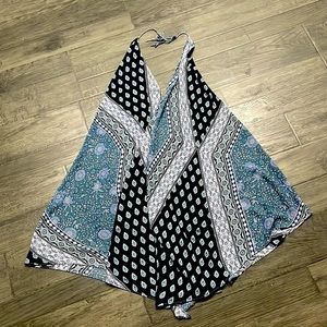 Cute skimpy dress or over a bathing suit as a cover up.